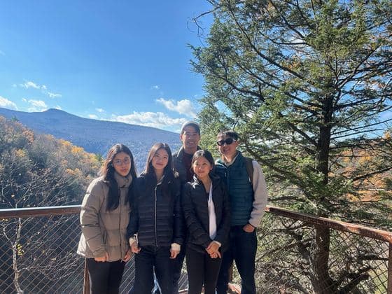 Friends at a mountain lookout in autumn