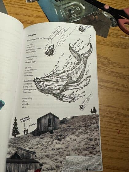 A whale drawn in ink across a poem